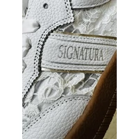 AC SNEAKER CSIPKE BETÉTTEL
